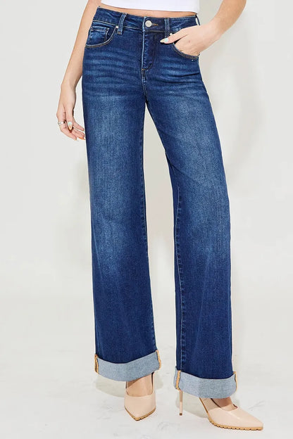 High rise Christina Wide Leg Jeans with tummy control panel and wide leg cut in dark wash denim.