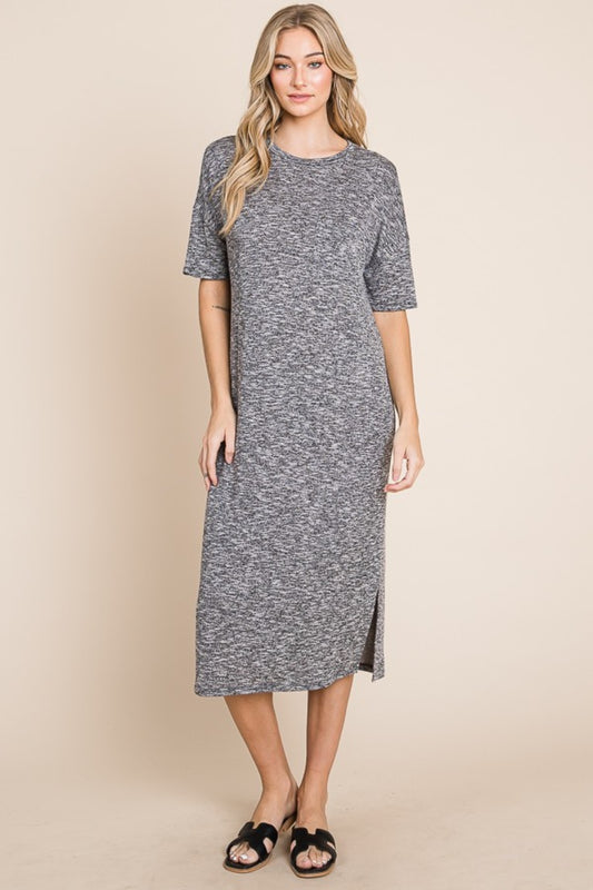 Grey midi dress with a round neck, half sleeves, and a slit detail.