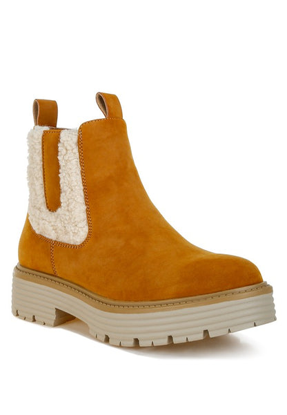 Tan Mothman Chunky Ankle Boots with faux fur trim, side zipper, and low block heel.