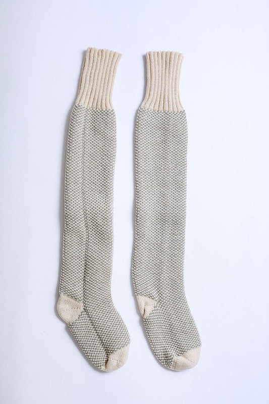 Flat lay of oatmeal Jerica Lounge Socks showing knitted open-work design.