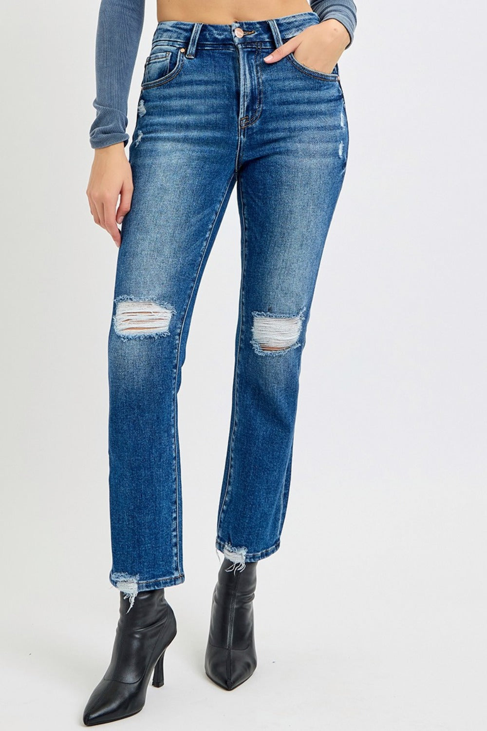 High Rise Distressed Crop Straight Jeans in dark wash with a high-rise fit, distressed details, raw hem, and slightly stretchy fabric for a cool, versatile look.