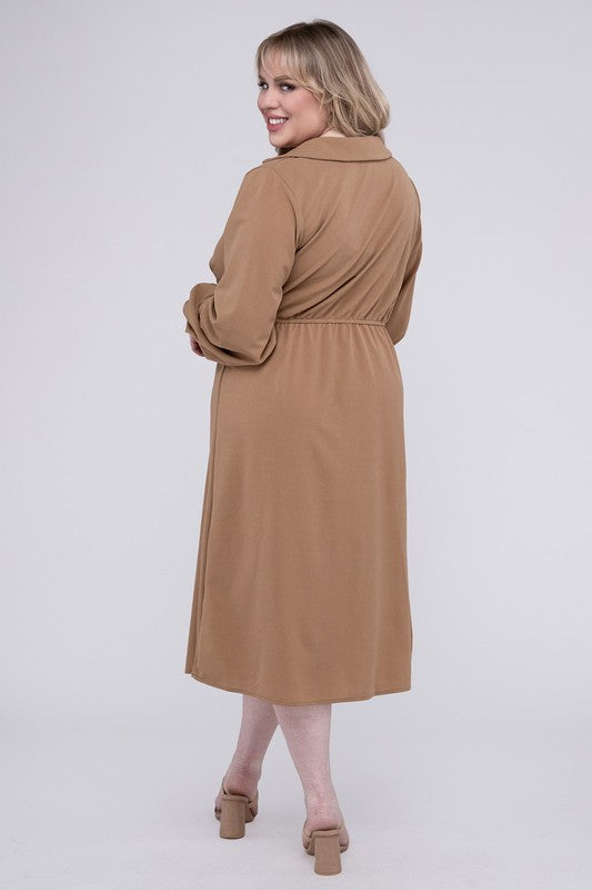 Camel colored wrap dress with twist front detail, collared V-neckline, and bishop sleeves. Features gentle ruching and midi length.