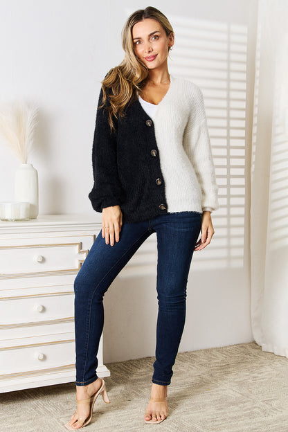 Black and white patterned cardigan with a V-neck, long sleeves, and button front.