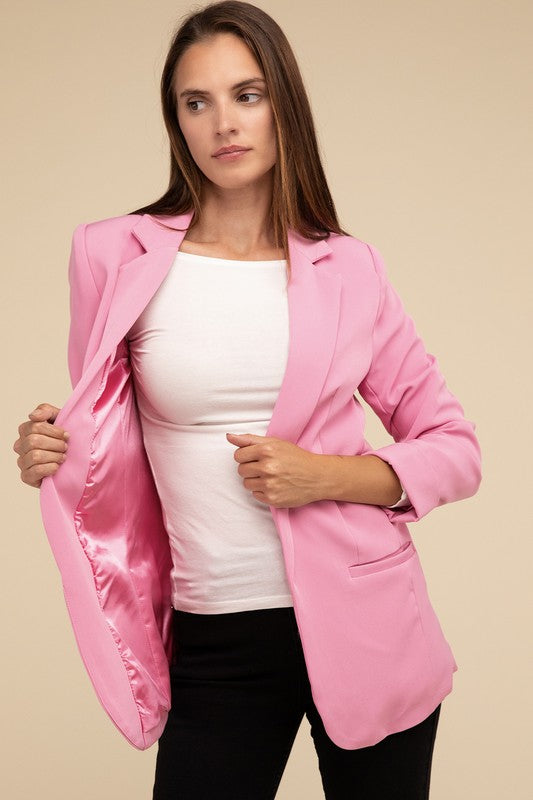 A candy pink woven blazer with a lapel neckline, long sleeves, and an open-front design. Features front pockets and a regular fit.