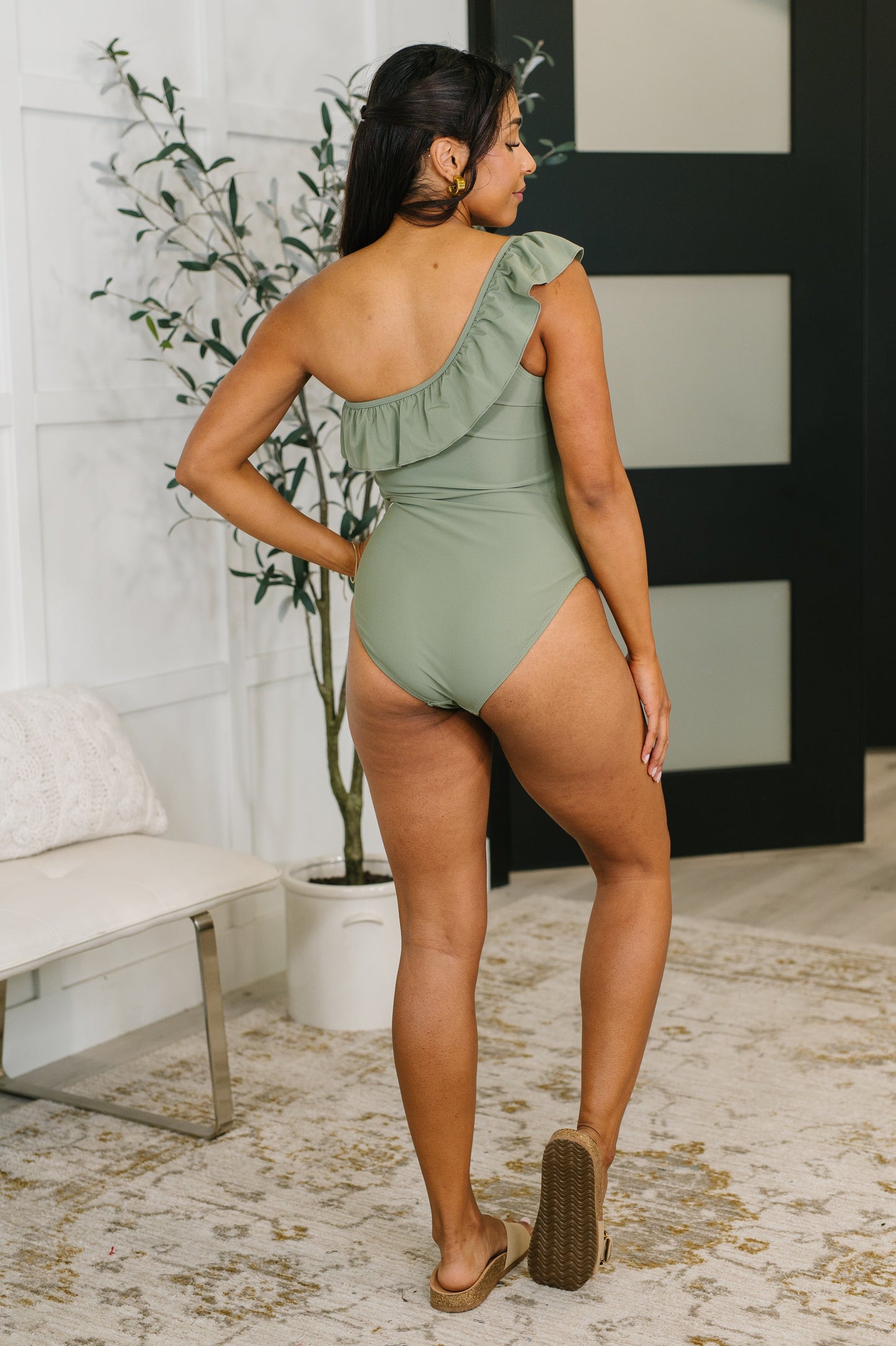 Back view of Tan Line Happiness One Piece Swim Suit sleek one piece silhouette.