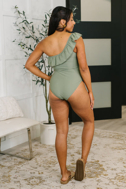 Back view of Tan Line Happiness One Piece Swim Suit sleek one piece silhouette.
