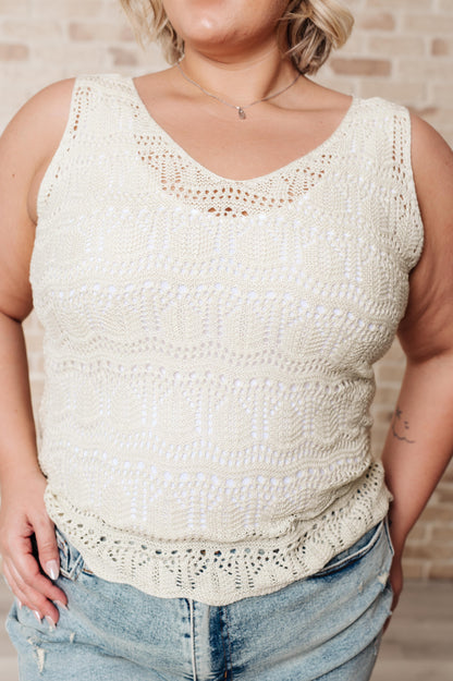Cream-colored Ada Open Knit Tank with a breathable hollowed-out pattern, lightweight sweater knit fabric, and a flattering V-neckline.