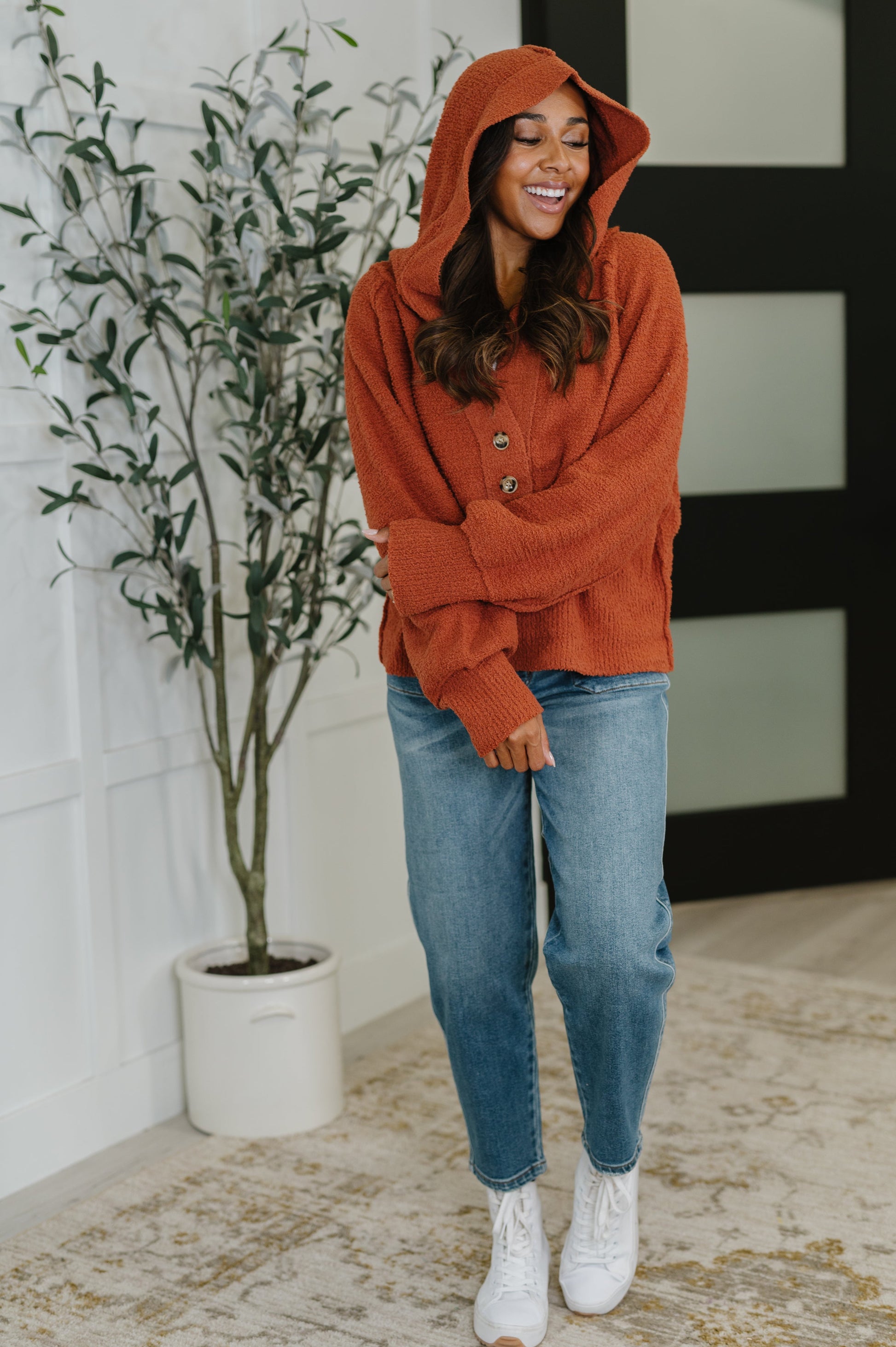 Full body view of Callen Henley Sweater worn with hood up and jeans