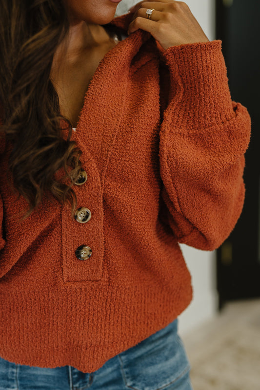 Close up of Callen Henley Sweater showing textured knit and button closure