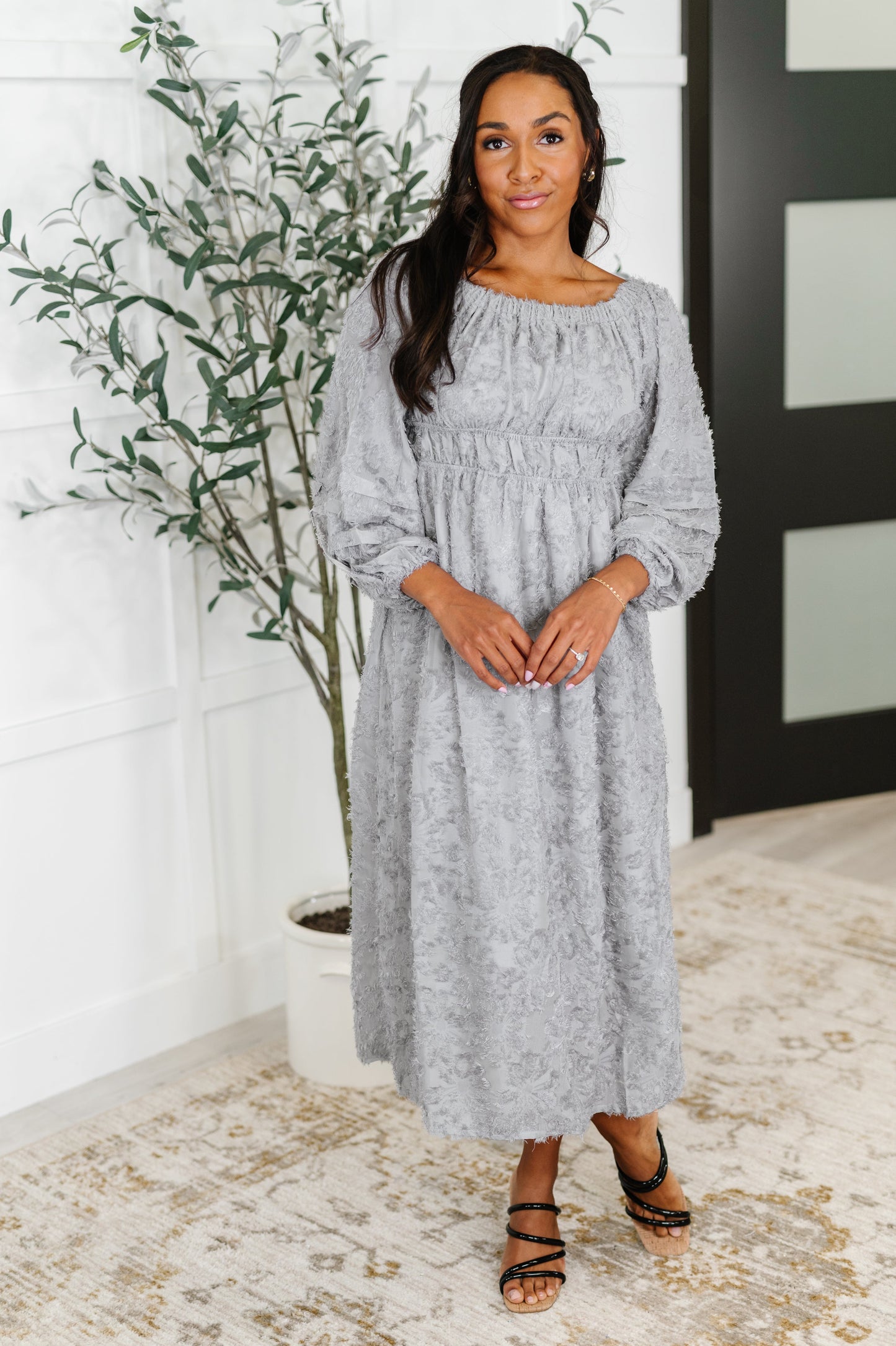 Full front view of Janelle Off Shoulder Floral Chiffon Midi Dress worn on-shoulder, featuring flowy silhouette and delicate floral print.