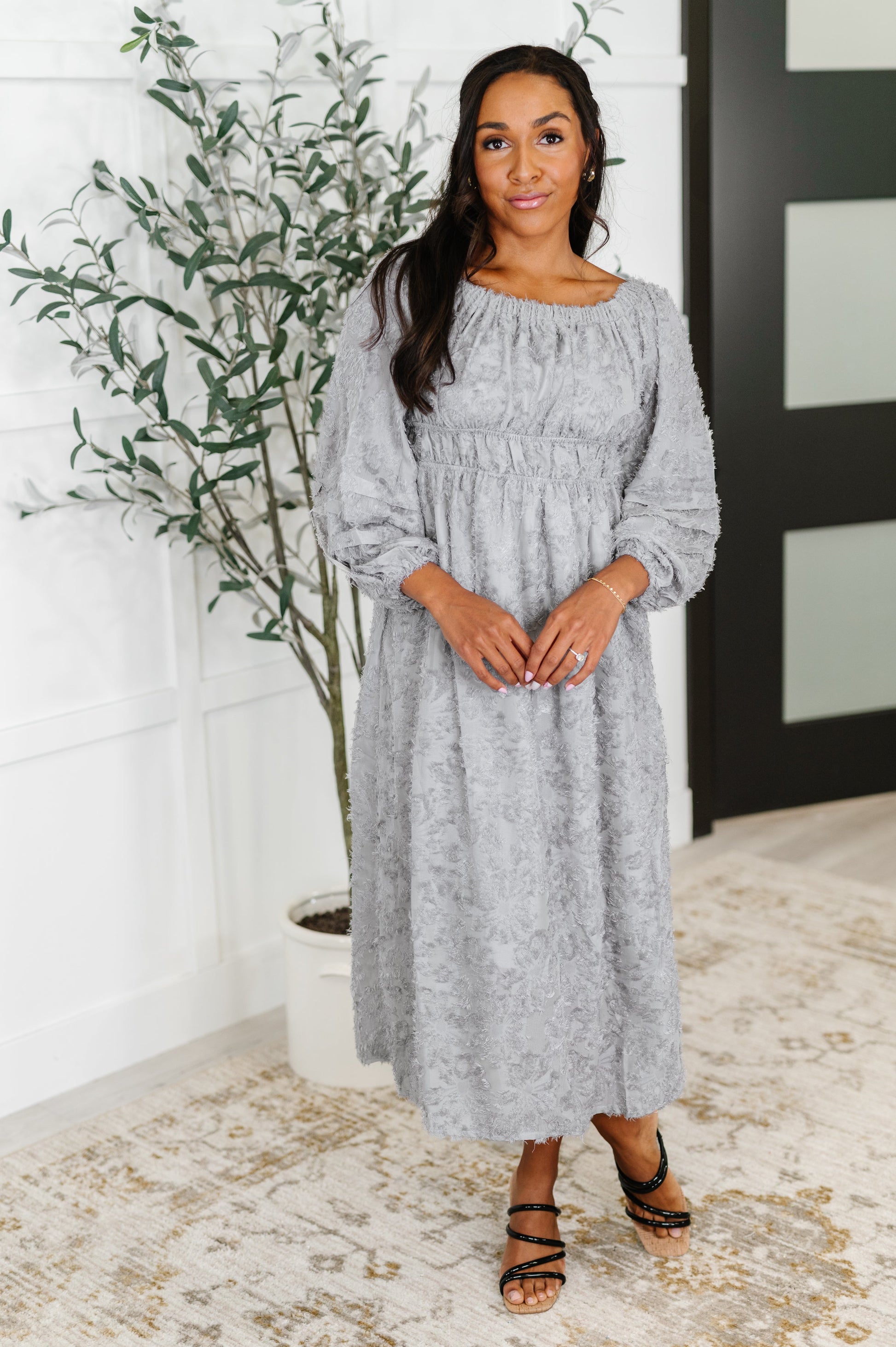 Full front view of Janelle Off Shoulder Floral Chiffon Midi Dress worn on-shoulder, featuring flowy silhouette and delicate floral print.