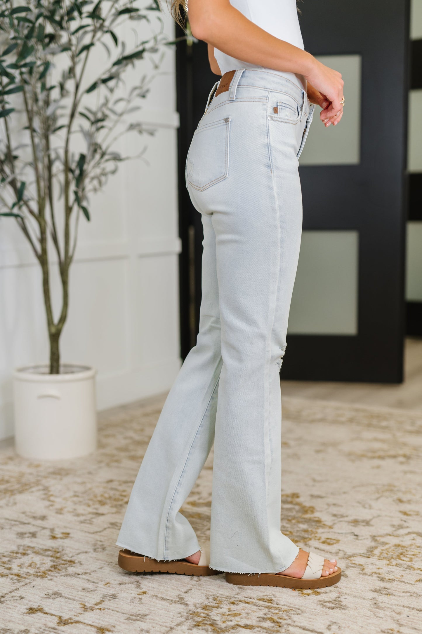 Side view of Alyse Bootcut Judy Blue Jeans highlighting 4-way stretch and flattering bootcut fit.