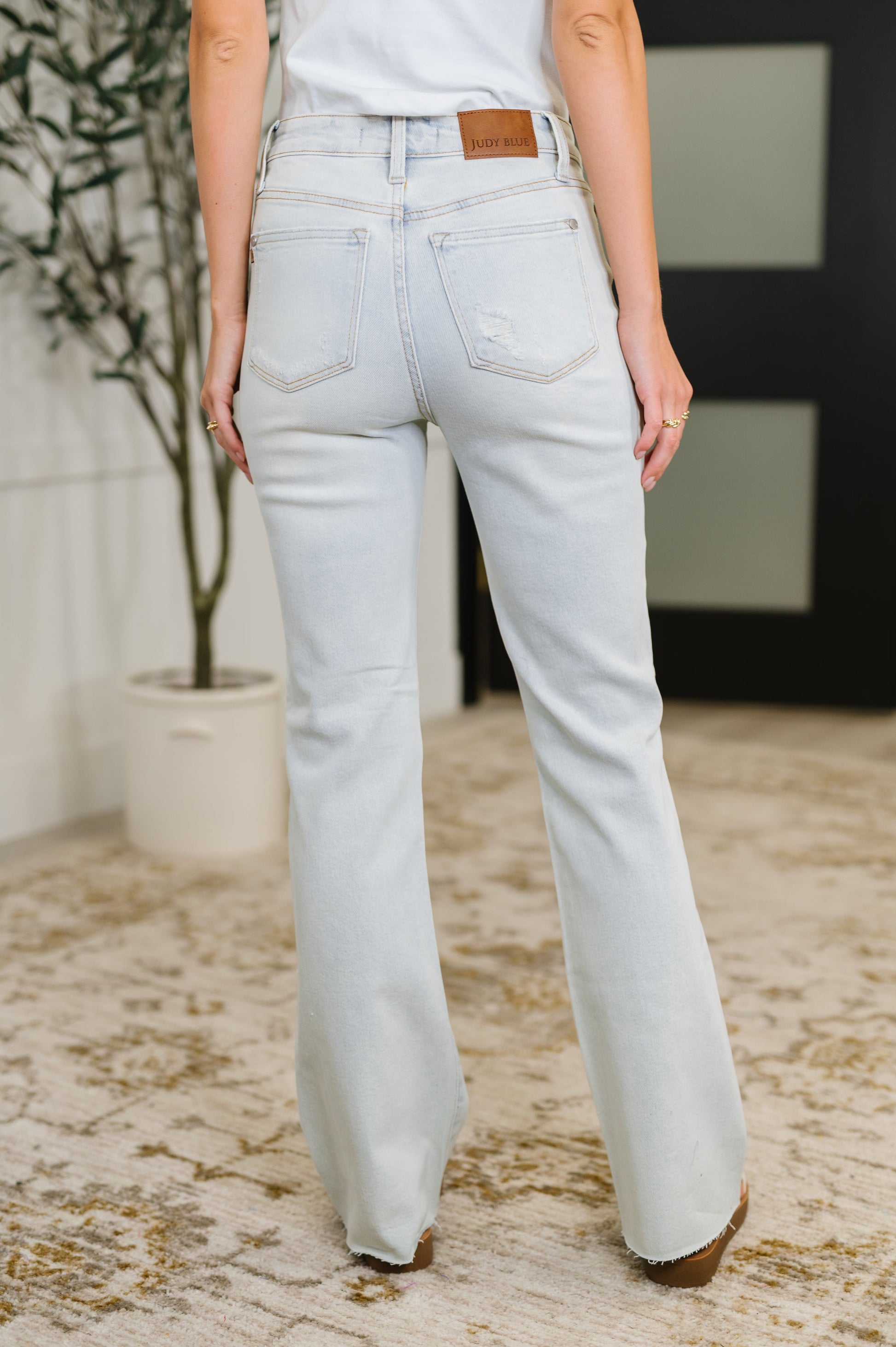 Back view of Alyse Bootcut Judy Blue Jeans showing flattering mid-rise fit and bootcut silhouette.
