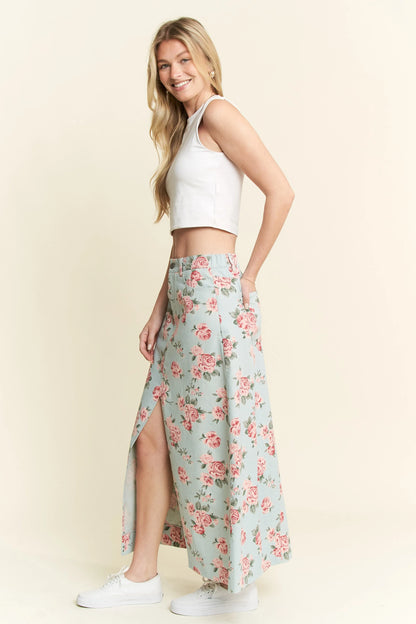 High-waisted size-inclusive denim maxi skirt with vintage floral design and slight stretch for everyday comfort.