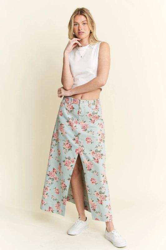 Angie plus-size friendly floral print denim maxi skirt featuring a romantic pink pattern and stylish front slit.