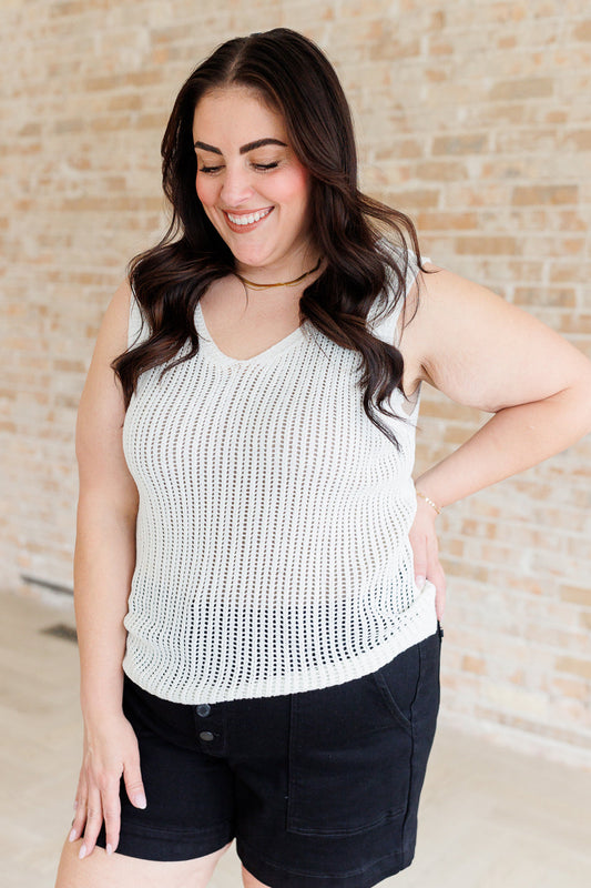 Plus size white v-neck sweater tank top with ribbed hem – high stretch.