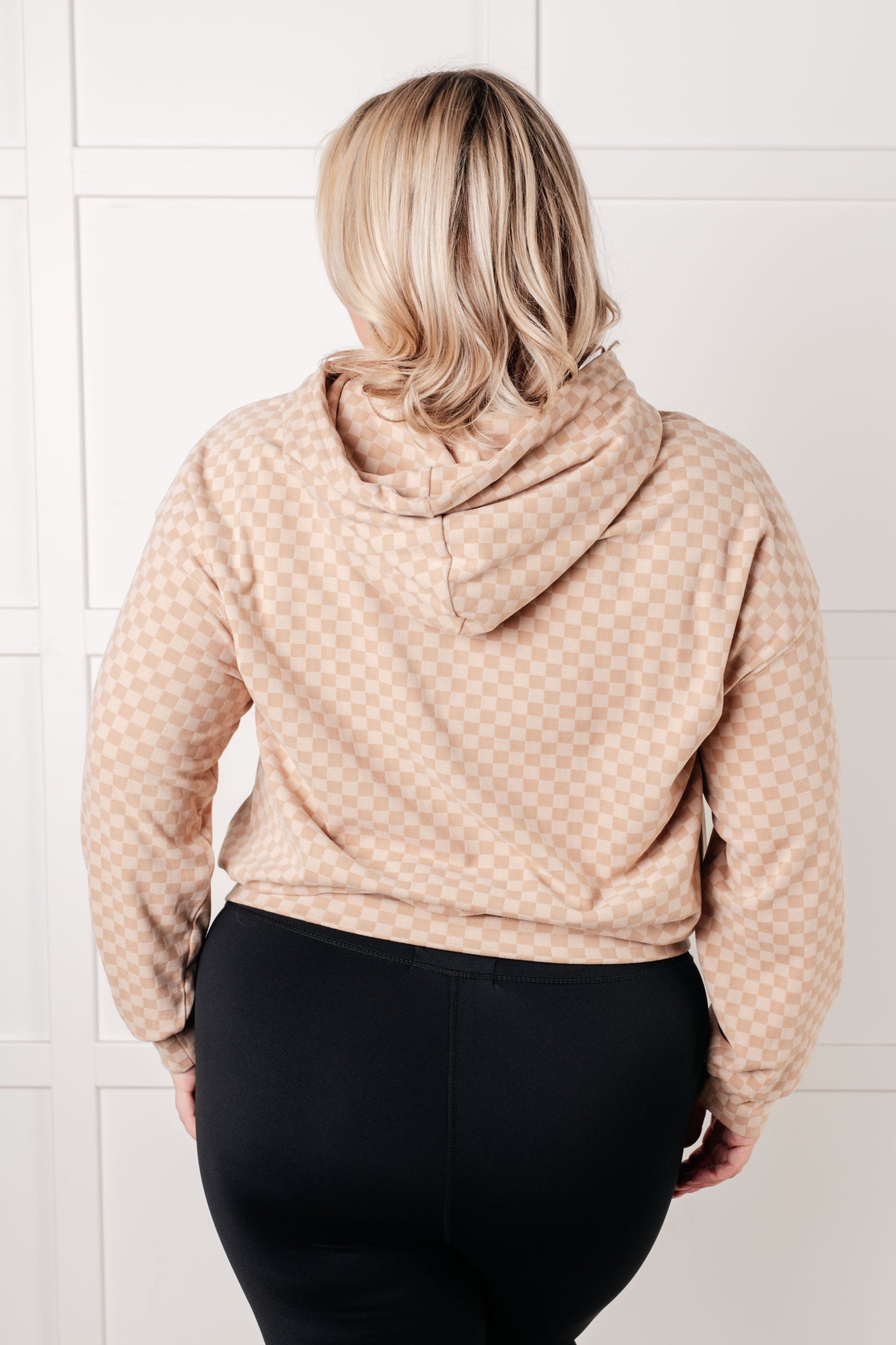 Plus size back view of Dalia Checkered Hoodie in khaki showing relaxed silhouette and hood.