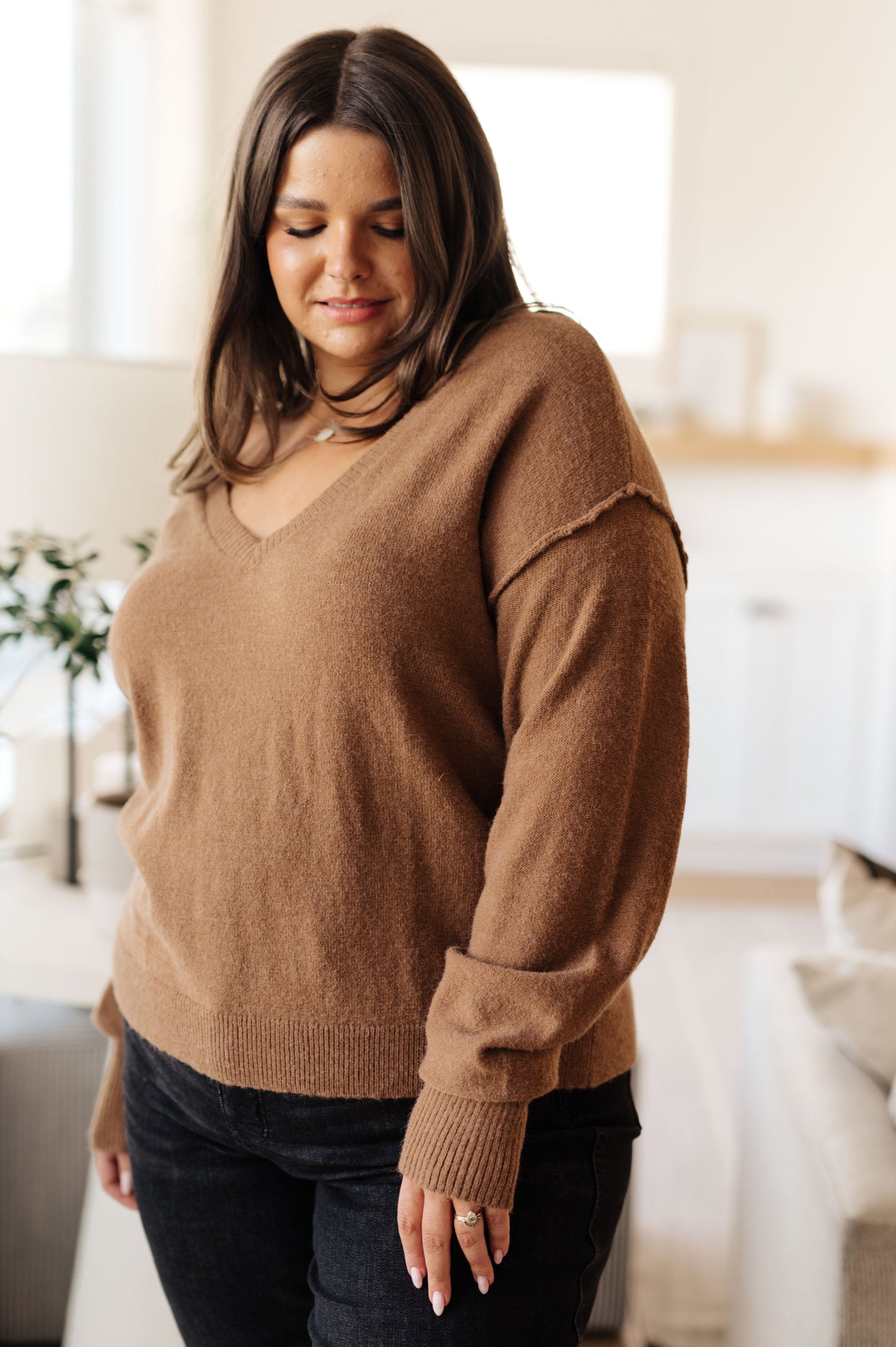Close-up of plus size Bambi V-Neck Sweater in Mocha showing knit texture and neckline.