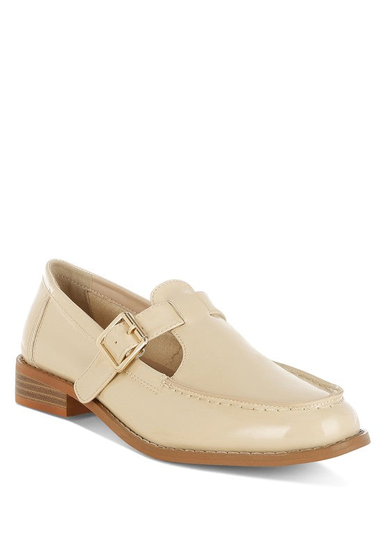Beige Swenson Mary Jane Loafers front angle, patent pleather with pin buckle strap and cushioned insole