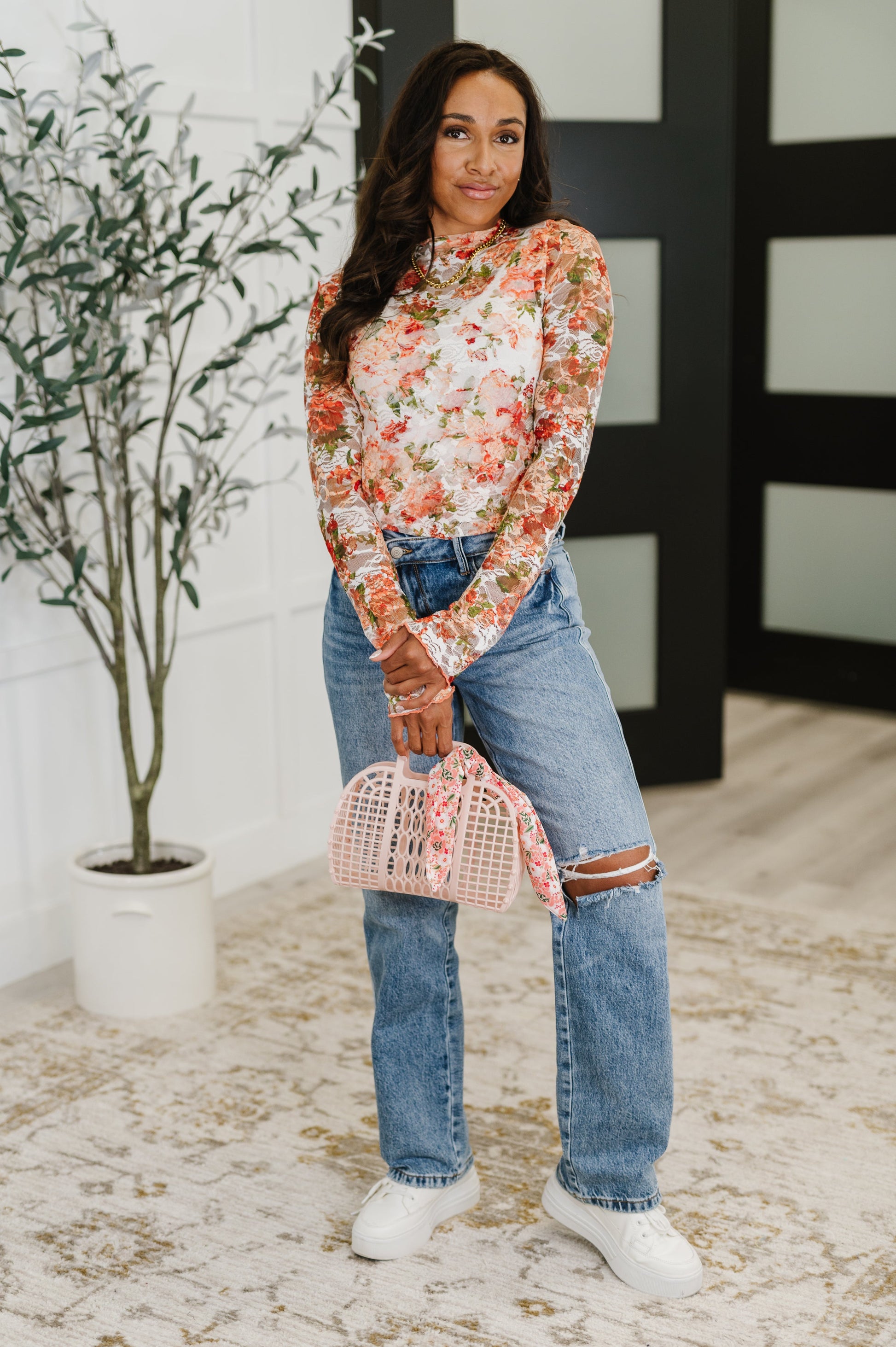 Beverly Coral Floral Lace Top front view – trendy sheer floral print with lettuce hem.
