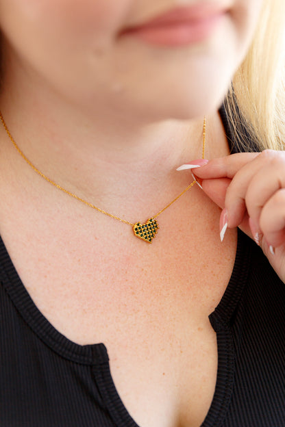 Bianca Checkered Heart Necklace displayed flat with gold-plated chain and clasp.