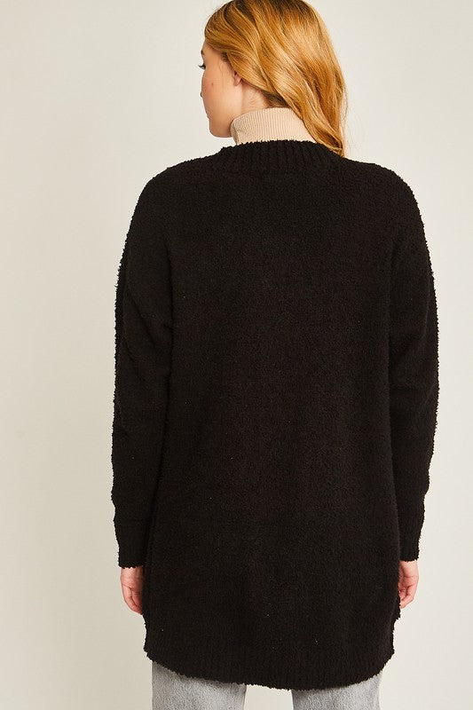 Black solid open-front long sweater cardigan with a V-neckline, long sleeves, and a loose fit.