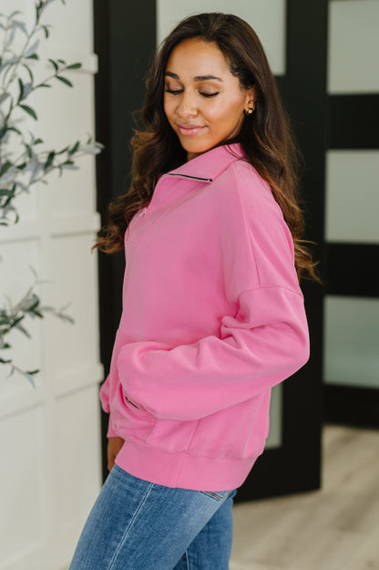 Side profile of Clarice Pink Half Zip Pullover, drop shoulder fit with ribbed hem and cuffs