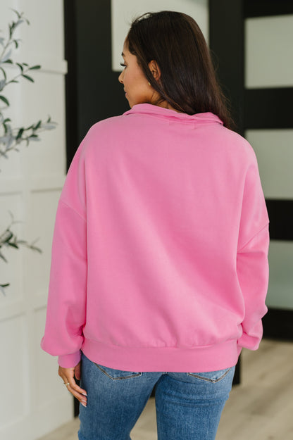 Back of Clarice Half Zip Pullover in pink fleece, relaxed drop shoulder fit with ribbed hemline