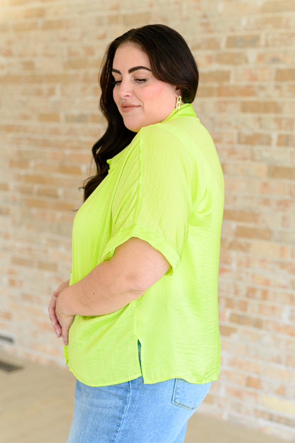 Trendy plus size woven button down top in citrus with side slits and no-stretch comfort fit.