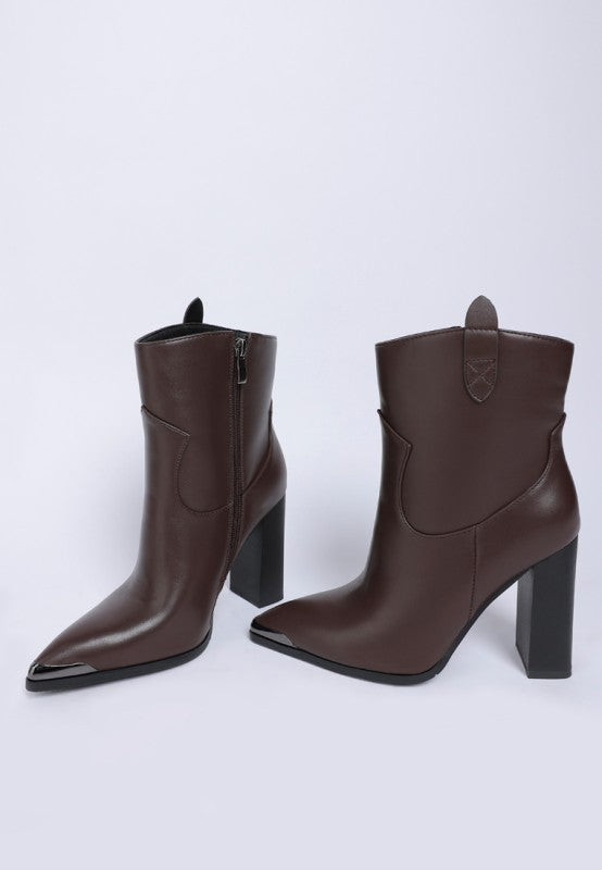 Pair of Brown Hatter Pointed Toe Boots showing medial and lateral side paneling details