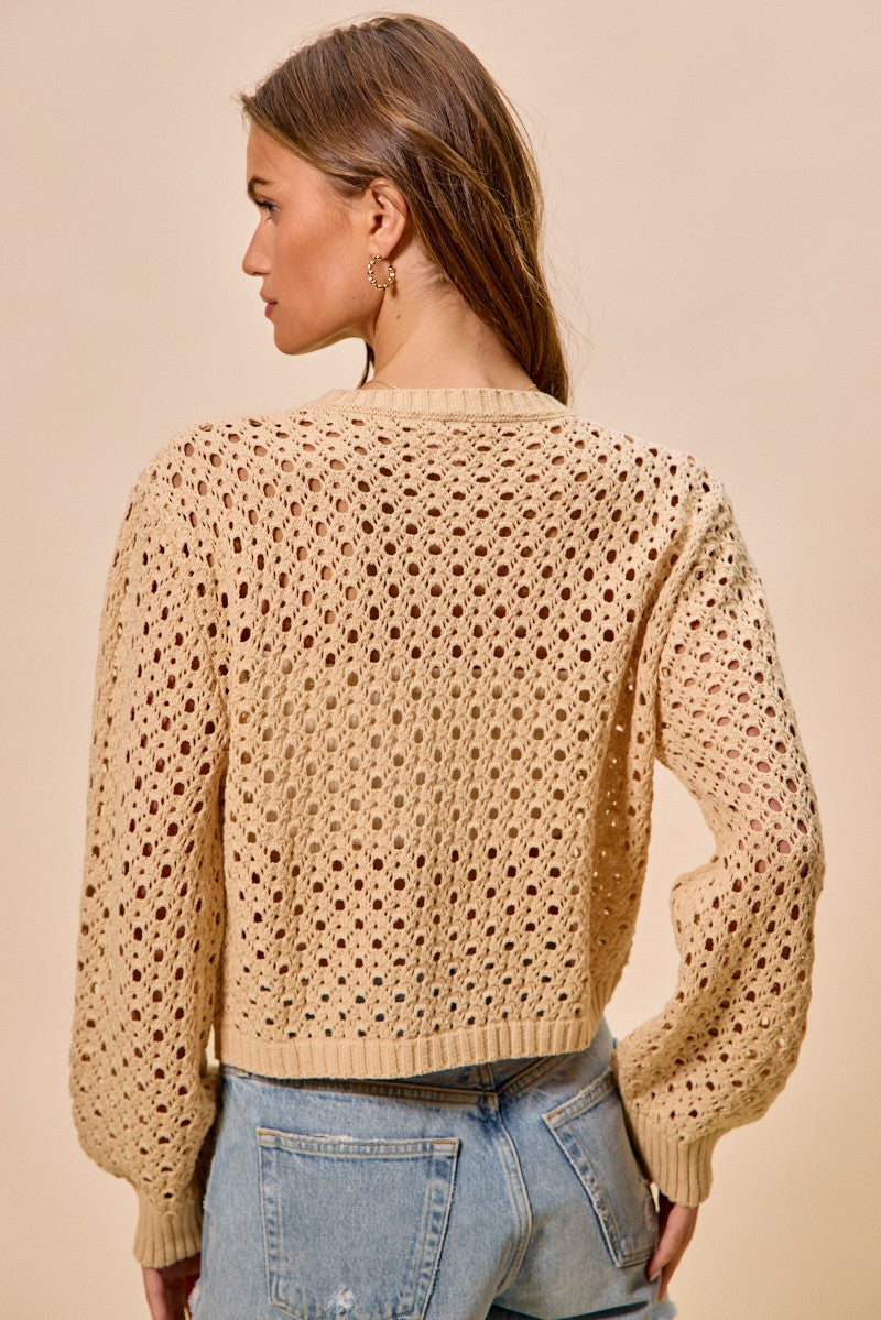 Back view of Casey Open Knitted Button Down Cardigan openwork knit and long sleeves.