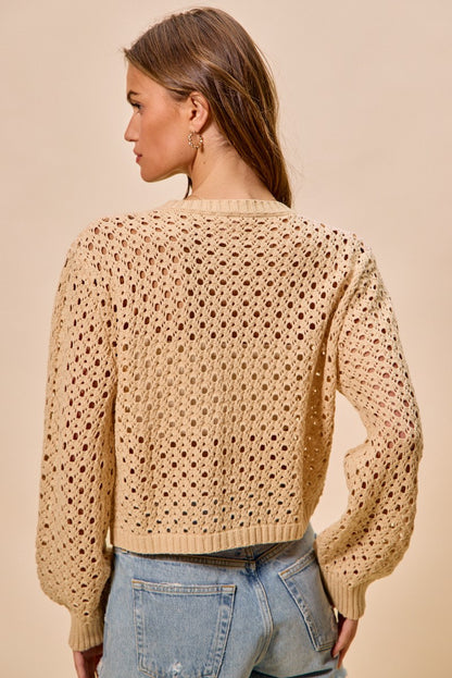 Back view of Casey Open Knitted Button Down Cardigan openwork knit and long sleeves.