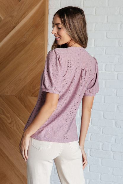 Back view of light mauve knit eyelet Chance Pleat Front Blouse with pleated front detail.