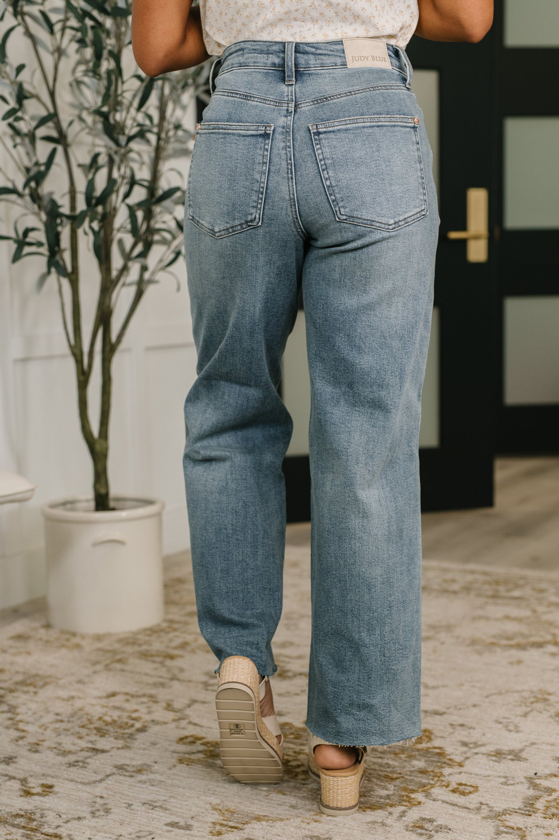 Back view of Ciera High Waist Rigid Magic Wilhelmina Baggy Jeans by Judy Blue stretch back.