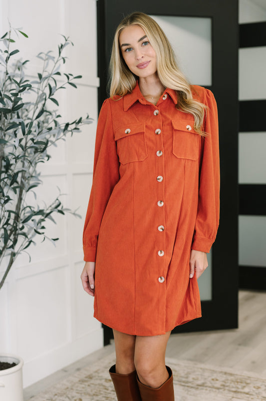 Clea Corduroy Shirt Dress in orange, collared neckline, long sleeves, relaxed fit front view.