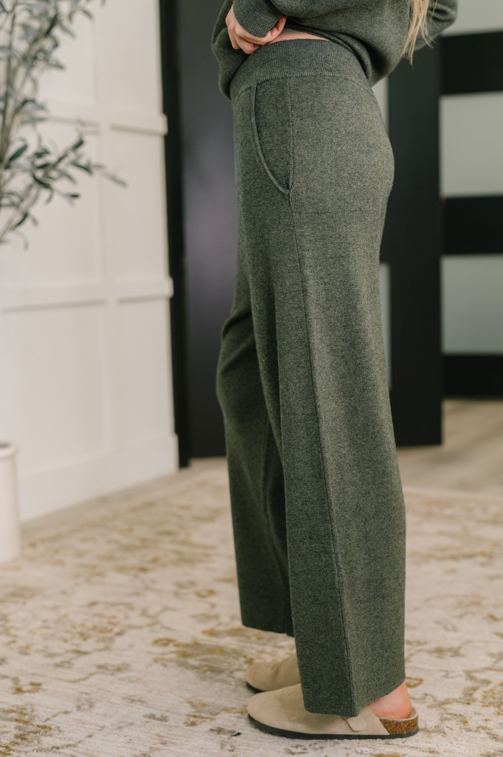 Side view of Clove Culottes in Moss highlighting wide leg silhouette and pockets
