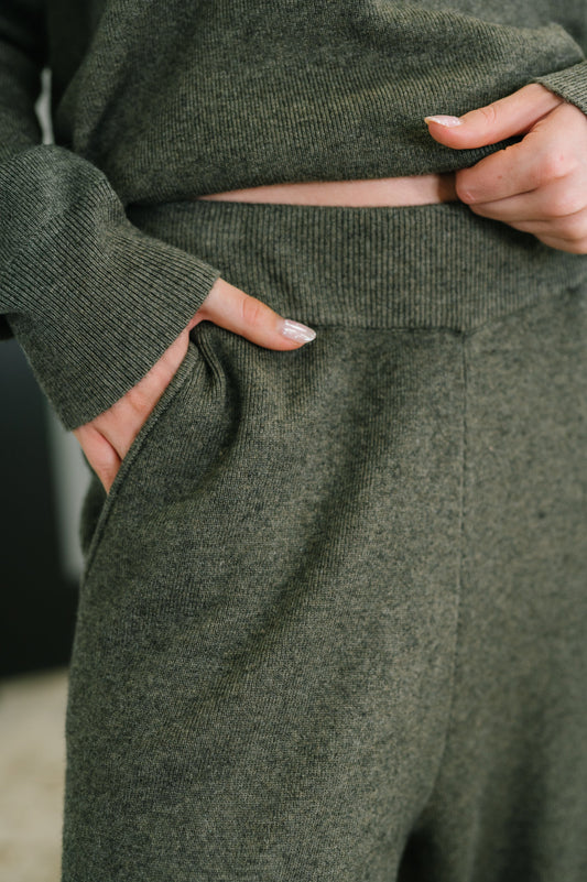 Close-up of cased elastic waistband, pockets and ribbed knit fabric on Clove Culottes in Moss