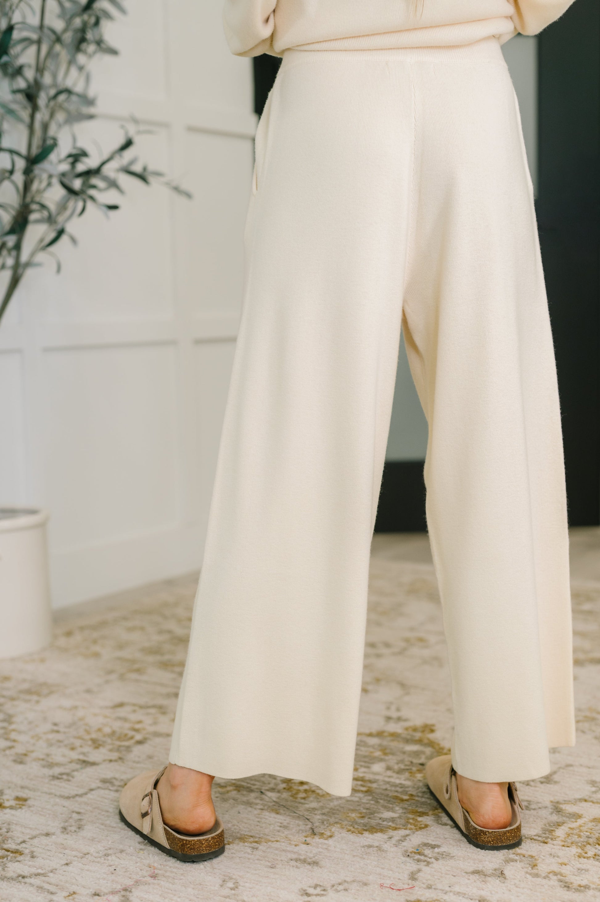 Back view of Clove Culottes in Oat with elastic waistband and ribbed knit texture
