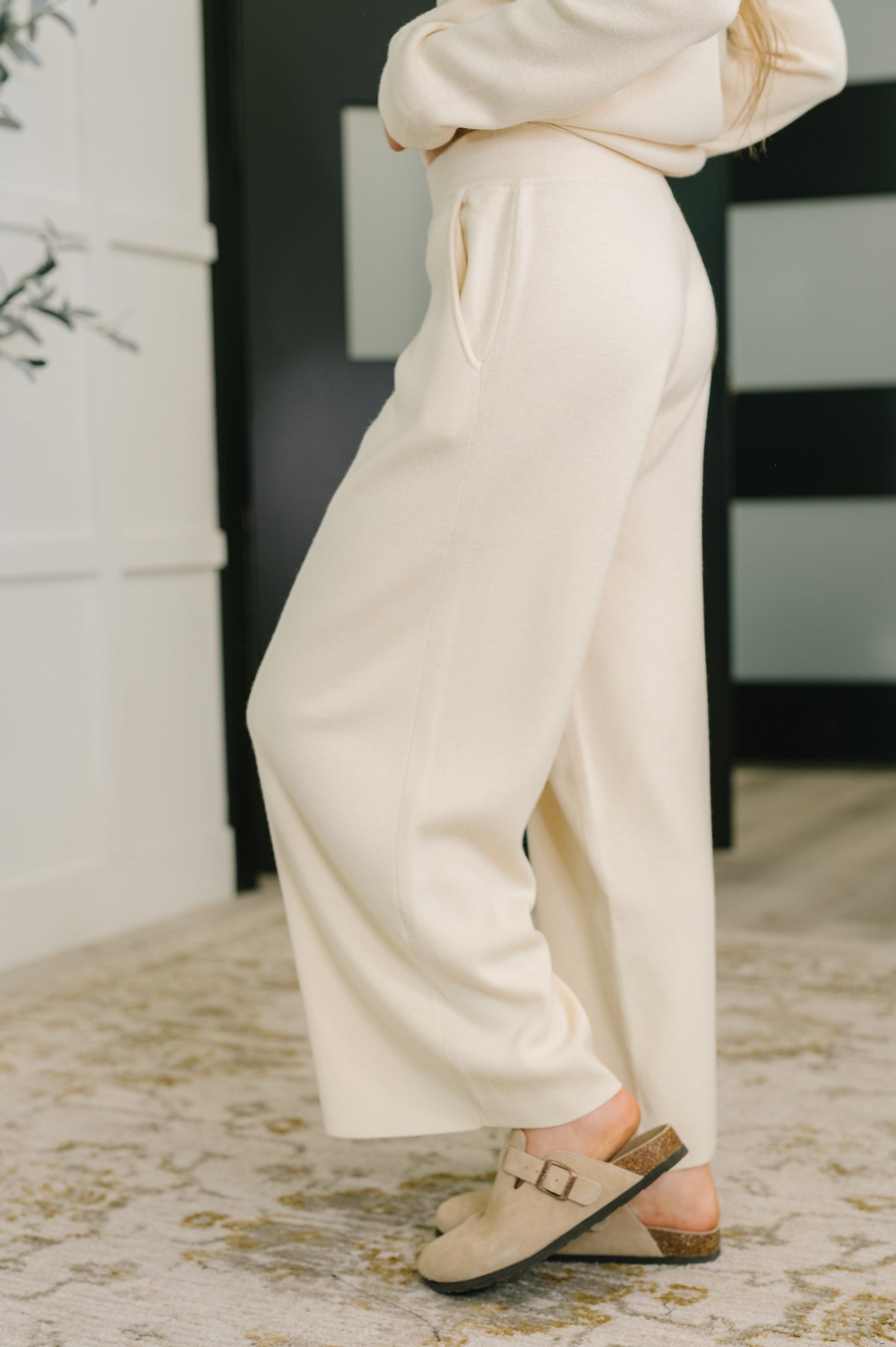 Side view of Clove Culottes in Oat showing flowy wide leg fit