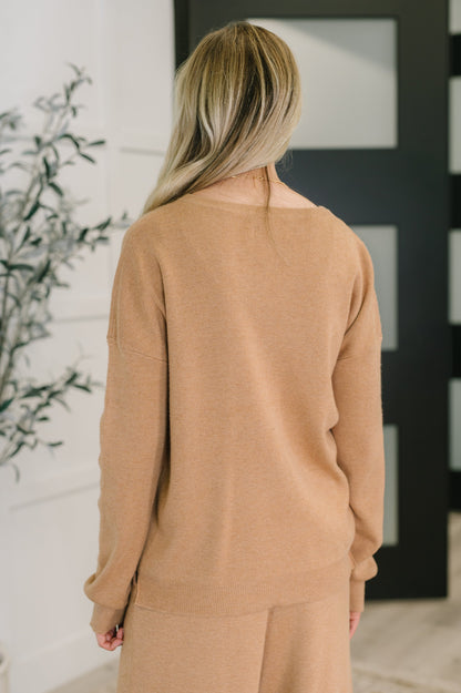 Close-up of ribbed knit texture on Clove Sweater in Camel neckline