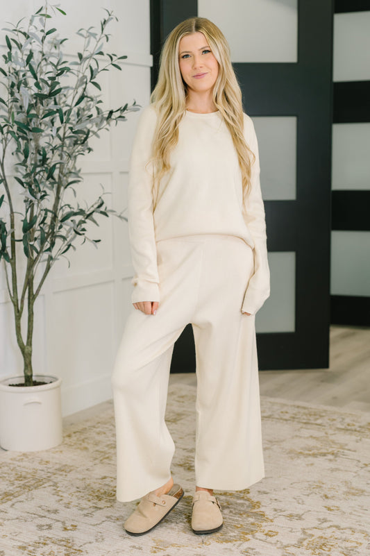 Full body view of model wearing Clove Sweater in Oat with matching Clove Culottes