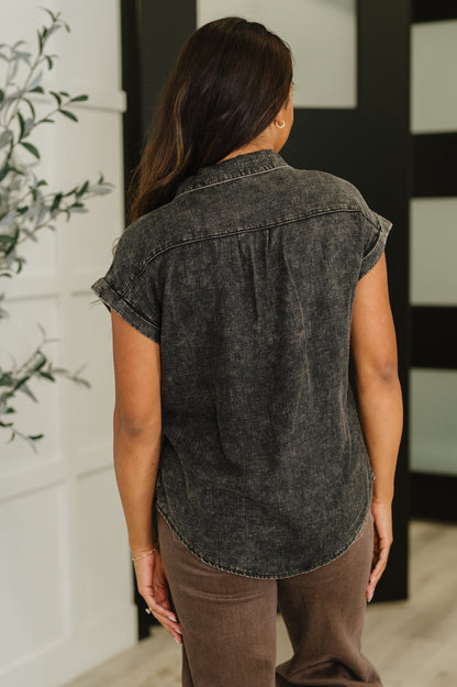 Back view of Waverly Button Down Blouse in lightweight ash black woven fabric