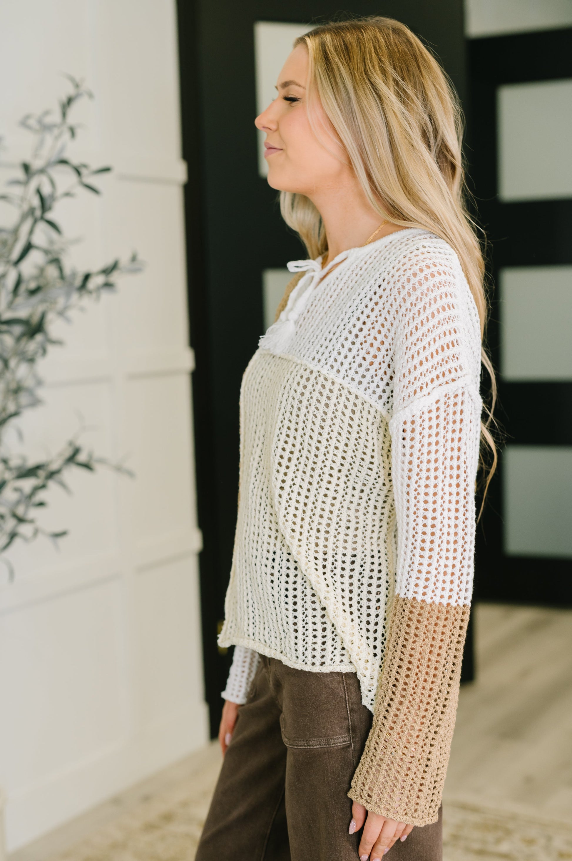 Beige Danielle Loose Knit Sweater with exposed seams and relaxed fit.