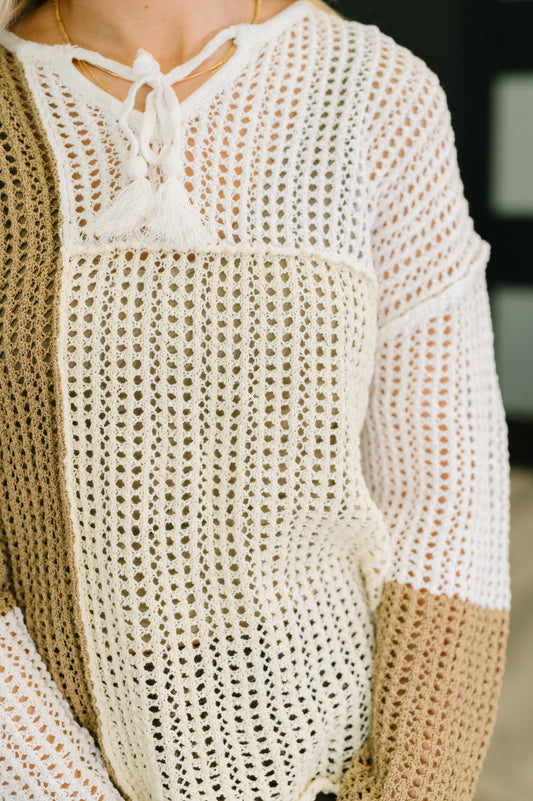 Danielle Loose Knit Sweater showing lightweight open knit texture and necktie detail.