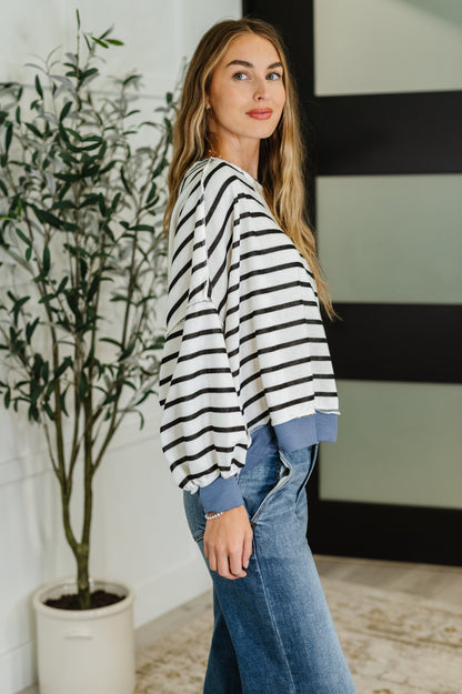 Side view striped French terry pullover with contrast banded neckline.