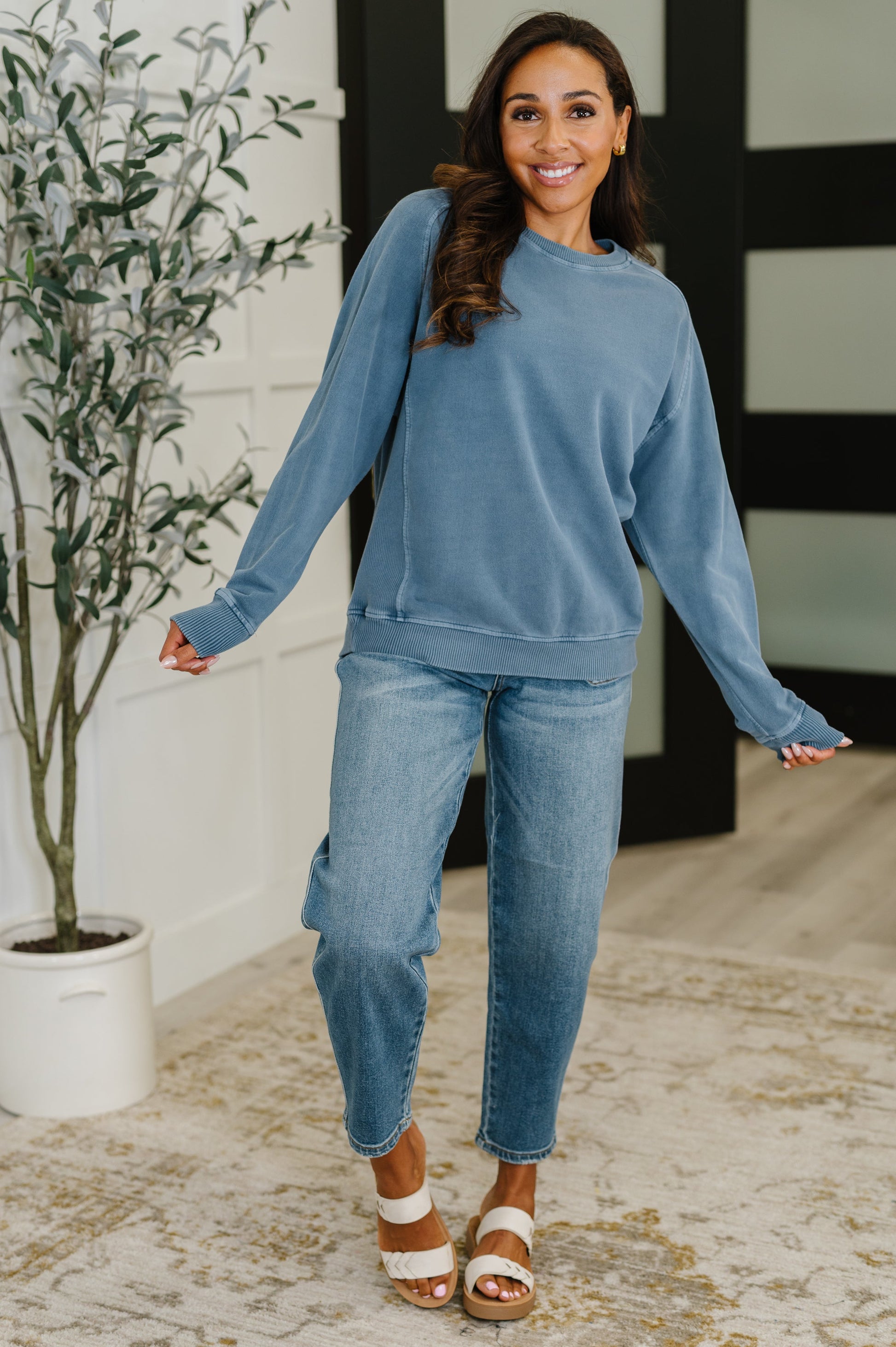Full body view of Nicia Dusty Blue Mineral Wash Pullover styled casually