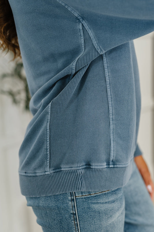 Close-up of Nicia Dusty Blue Mineral Wash Pullover, ribbed knit contrast and French terry texture
