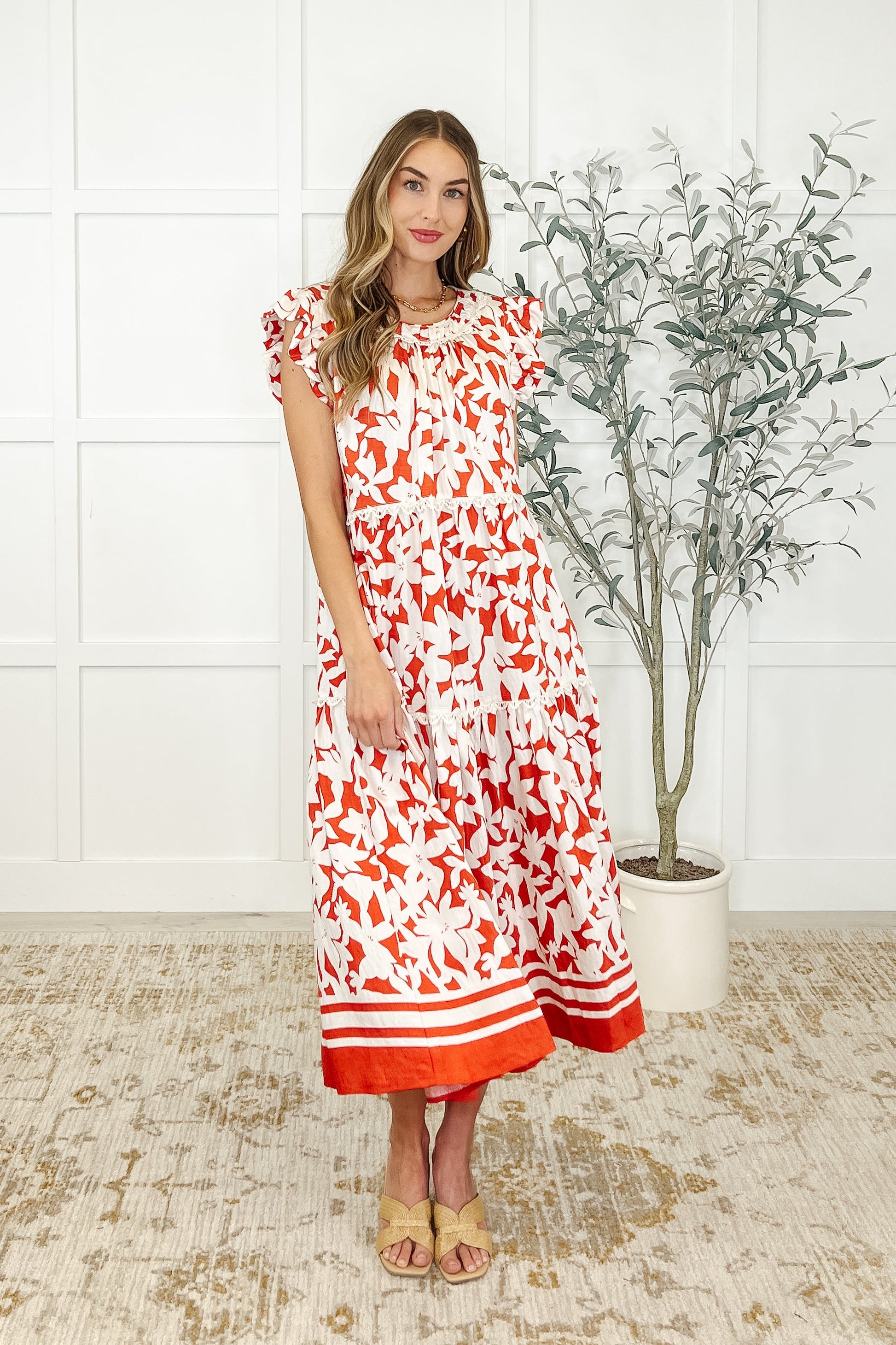 White and red Daine Tiered Dress front view with flutter sleeves and lace trim.
