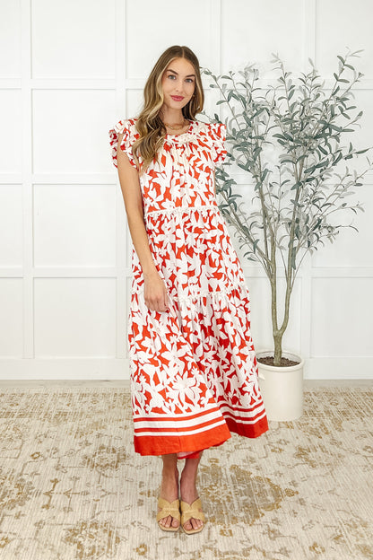White and red Daine Tiered Dress front view with flutter sleeves and lace trim.