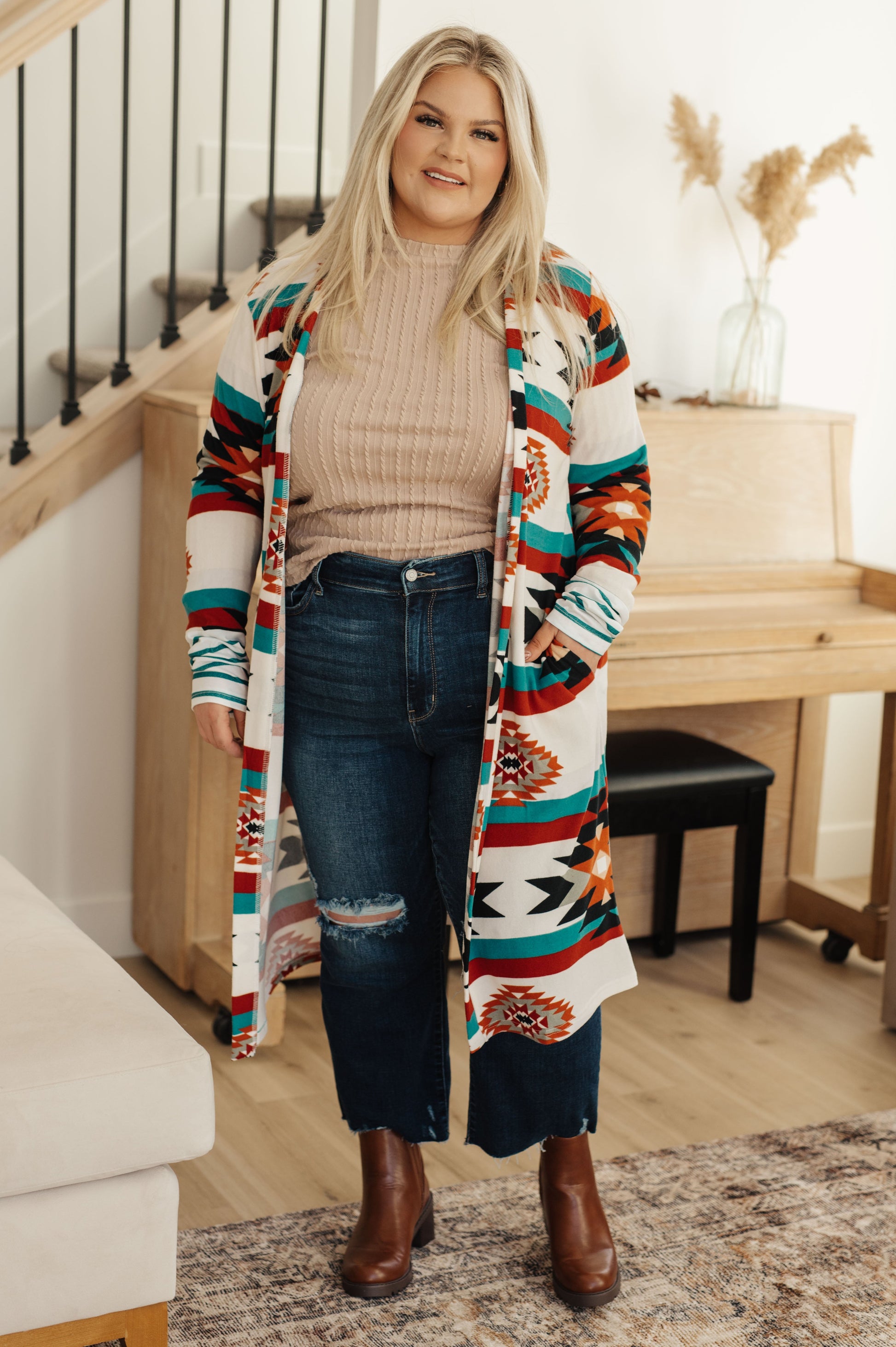 Plus size model styled full body in Marlo Cable Detail Top, beige knit with casual relaxed fit